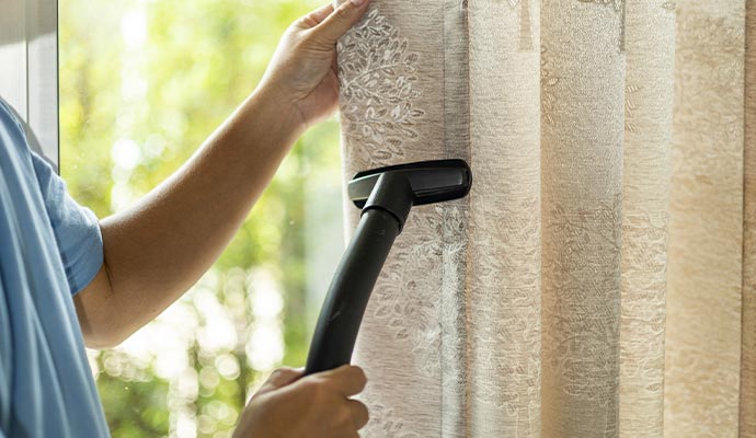 Professional cleaning drapery using equipment