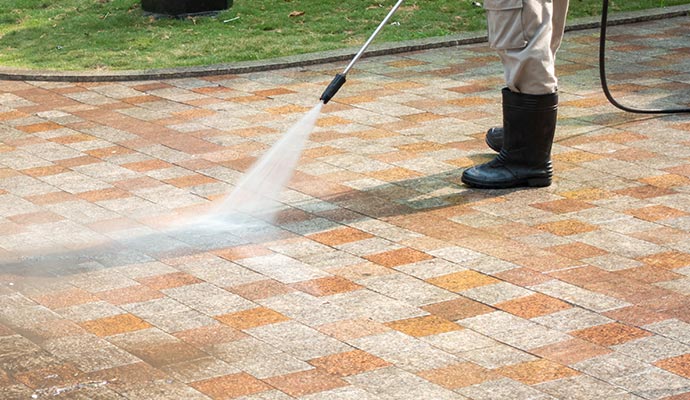 Outdoor tile cleaning with pressure washer