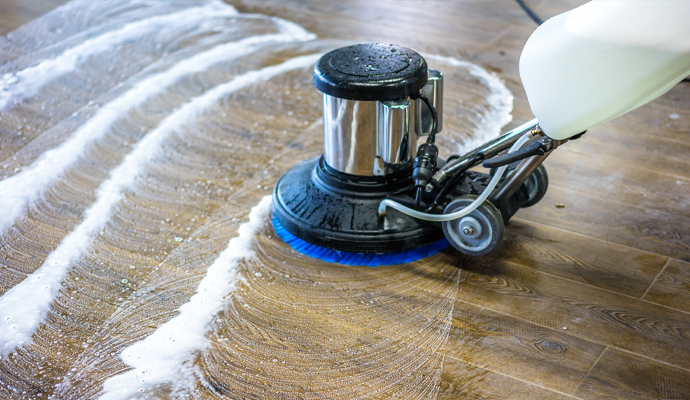 Hardwood floor cleaning with washing machine.